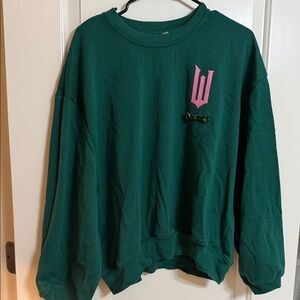 Women's Green Wicked Crew Neck Sweater with Pink Detail and jewels.